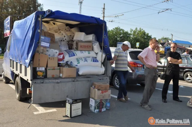 В зону АТО повезли дині та кавуни для військових (Фоторепортаж) — фото 7